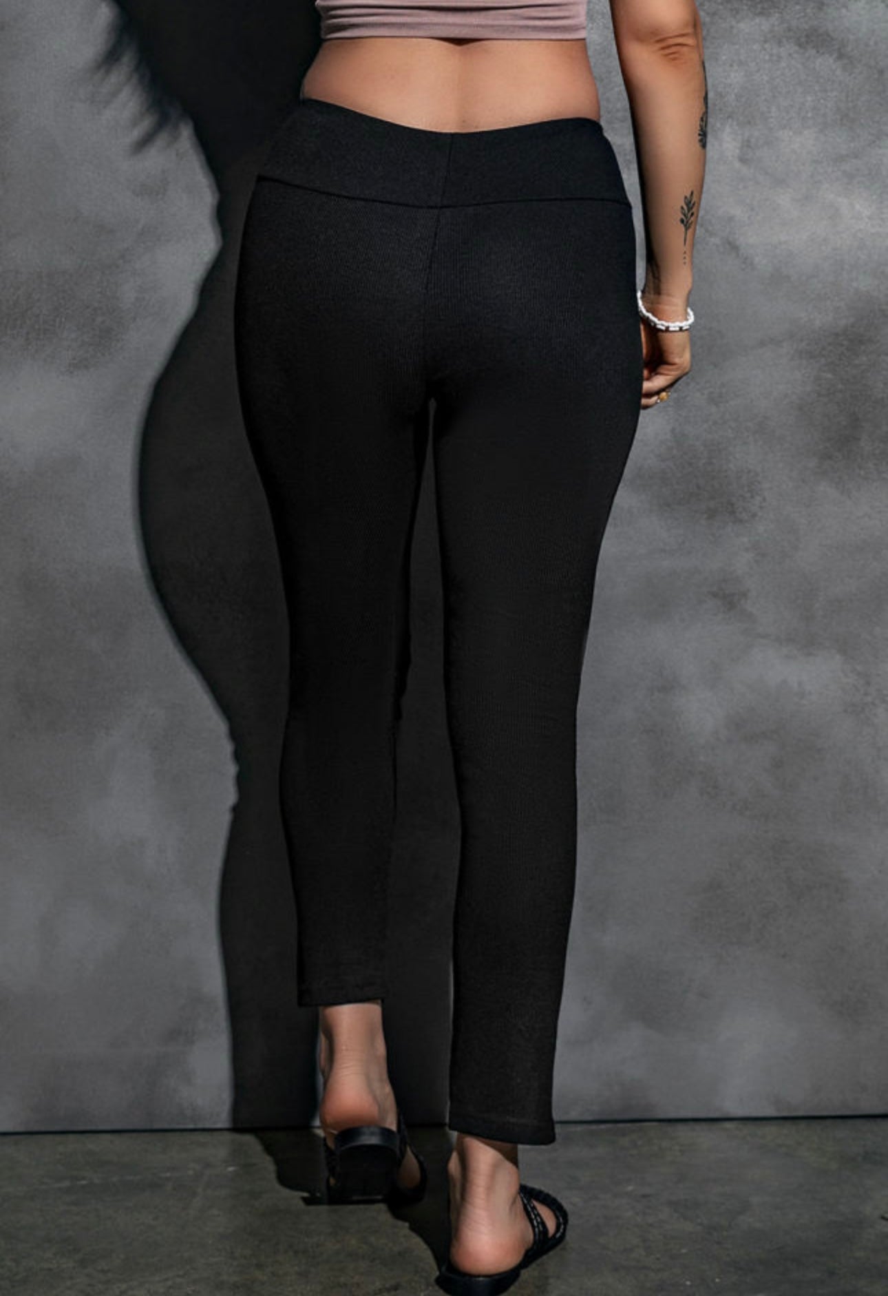 Black ribbed slit bottom leggings.