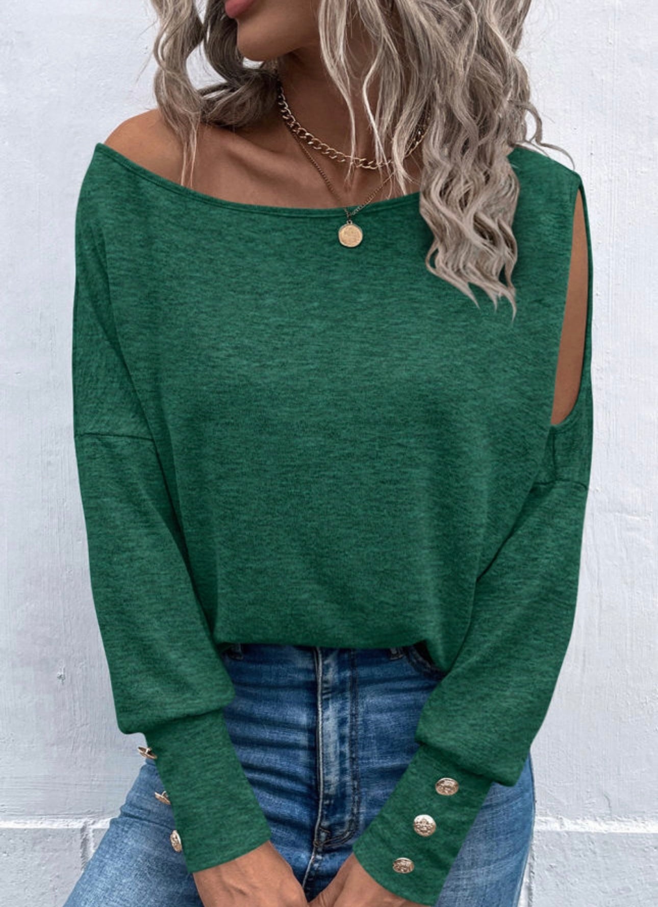 Green asymmetrical cut out shirt