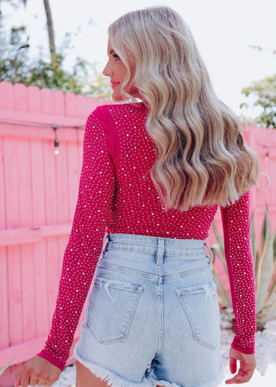 Pink rhinestoned bodysuit