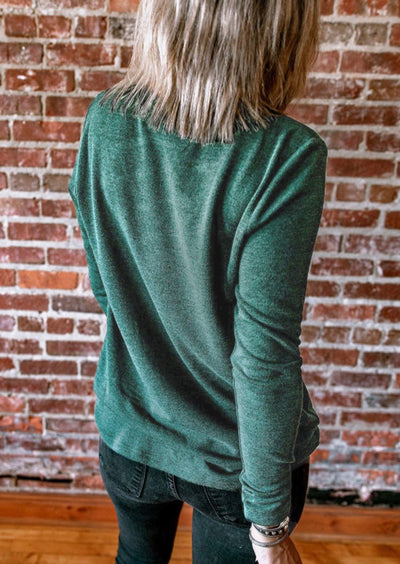 Green long sleeve criss cross top